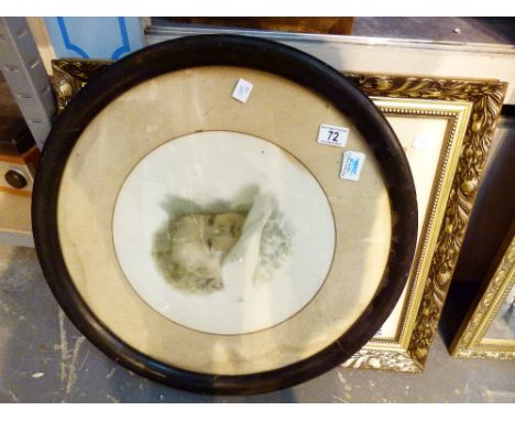 Two vintage prints including a circular framed baby picture