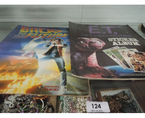 Two vintage sticker albums both Spielberg E.T and Back to the Future