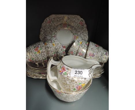 A vintage part tea service by Phoenix with chintz style pattern