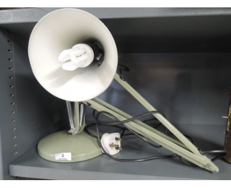 A vintage angle poise lamp in olive green