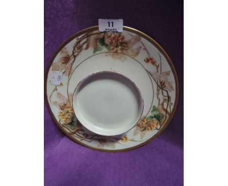 A vintage ceramic hand decorated plate by Limoges 