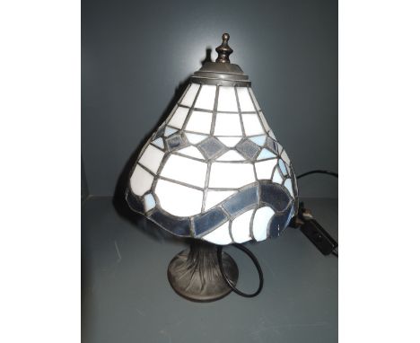 A modern tiffany style table lamp with leaded light shade