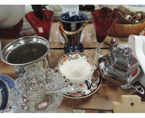 A selection of vintage decorations including ruby glass