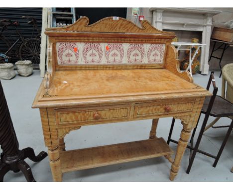 A scrumble tile backed wash stand with two under drawers