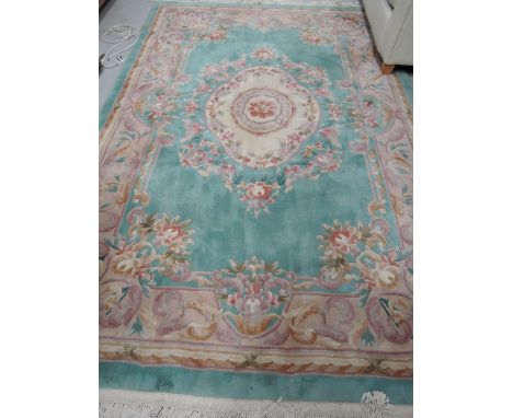 A modern carpet square with floral pattern approx 9ft x 6ft