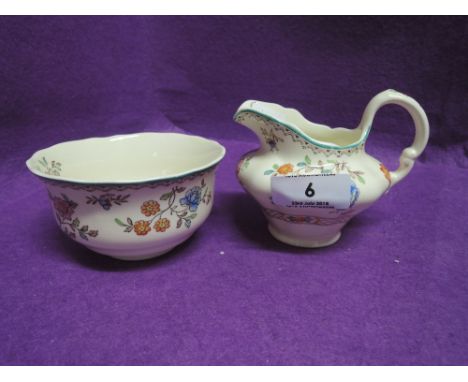 A vintage cream jug and sugar bowl by Copeland Spode in the Jasmine pattern