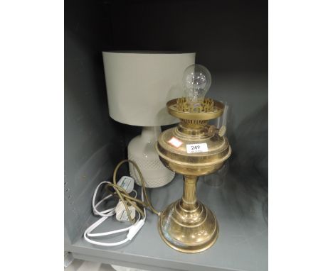 A modern table lamp and a converted oil lamp 