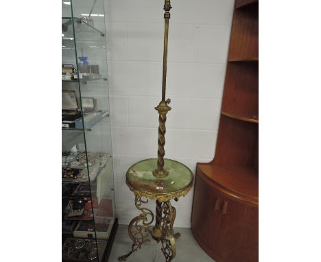 A brass and onyx standard lamp  