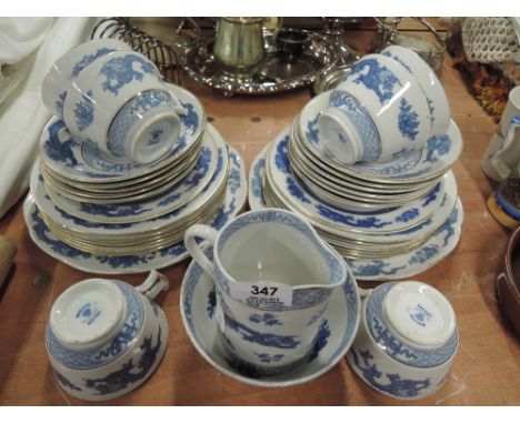 A part tea service by Booths with Chinese dragon print
