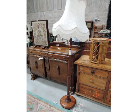 A vintage mahogany standard light