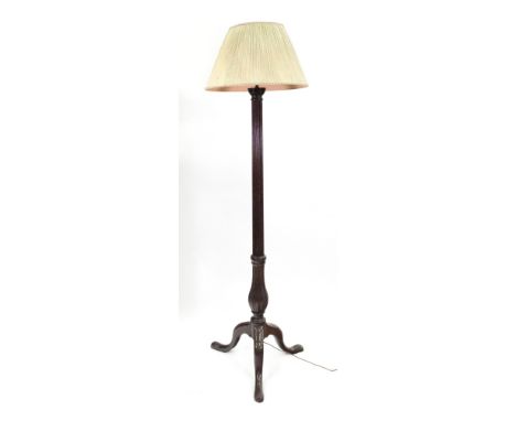 A Hepplewhite style mahogany reeded, lobed and fluted column standard lamp, with tripod base, 161cm high.
