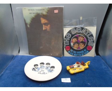 The Beatles memorabilia collection to include plate, Corgi toy yellow submarine, The Beatles song book and George Harrison My