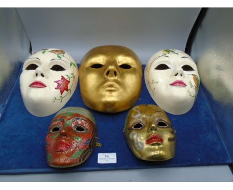 Quantity of wall masks - 3 ceramic and 2 brass and enamel