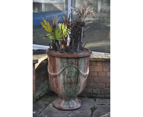 A superb French Anduze urn branded Boisset. Wonderfully timeworn with a traditional Verdigris  flame-glaze. 60cm wide 70cm ta