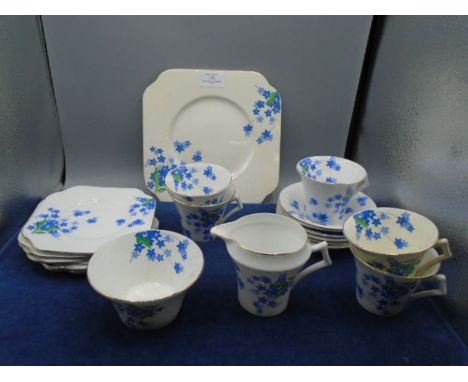 Colclough china part tea service in art deco blue flowers pattern 4117 to incl serving plate, 6 sandwich plates, 5 cups and 6