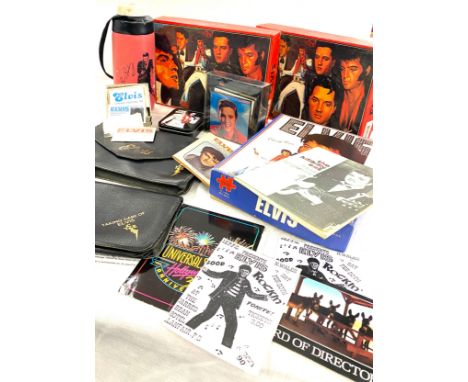 Selection of Elvis Presley memorabilia includes Puzzles, Flask, Taking care of Elvis bag etc 