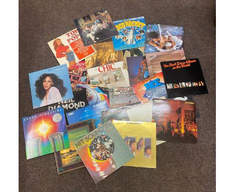Large selection of assorted genre vinyl records to include The Bee Gees, Boney M, Neil Diamond etc 
