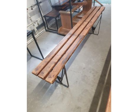 * Vintage slatted bench with folding metal legs. 1800w x 260d x 520h 