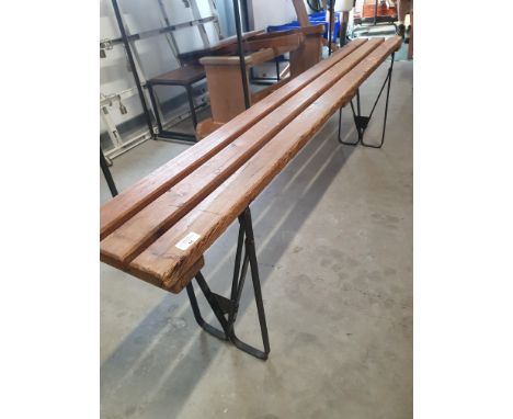 * Vintage slatted bench with folding metal legs. 1800w x 260d x 520h 