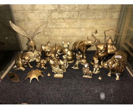 SHELF OF BRASS ANIMAL AND BIRD FIGURES AND FIRESIDE ORNAMENTS 
