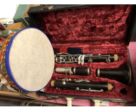 CASED CLARINET AND TAMBOURINE 