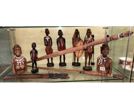 SHELF OF AFRICAN CARVED MASAI FIGURES