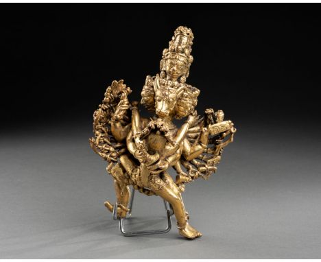 SINO-TIBETAIN - XXe siècle Yamantaka à vingt bras et sa parèdre Bronze ciselé et doré H. 16,5 cm Manque le socle, usures 