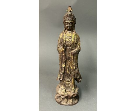 CHINE - XVIIe ou XVIIIe siècleBODHISATTVA se tenant debout sur un double lotus Bronze et traces de dorure H. 45 cm Manques, u