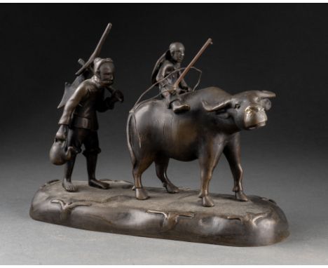 VIETNAM - XIXème siècle Paysans et buffle Groupe en bronze patiné 17,5 x 25.5 x 10.5 cm 