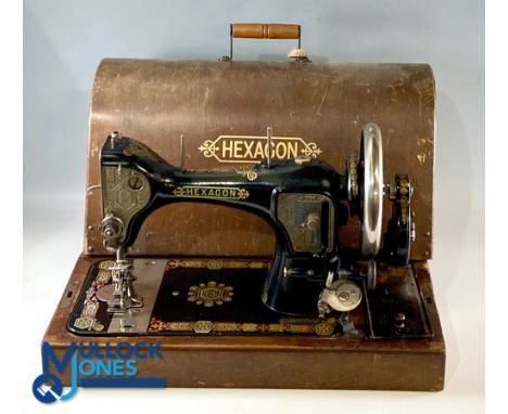 2x Period Hand Crank Sewing Machine Vintage models by Frister Rossmann Germany and Hexacon - both in wooden cases with signs 