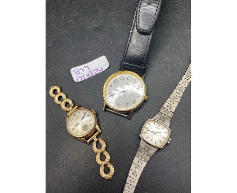 A ladies BUREN grand prix wrist watch and two others