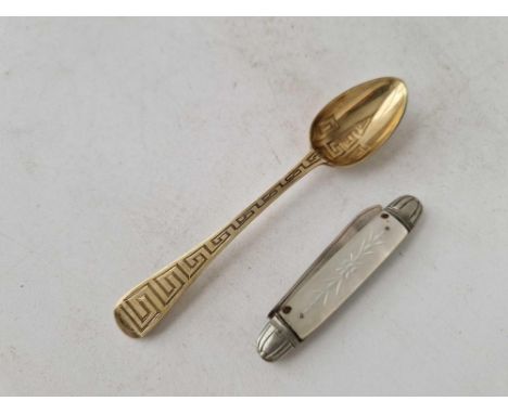 An unusual Victorian gilt spoon with Greek Key pattern, London 1862 by JH? and a fruit knife