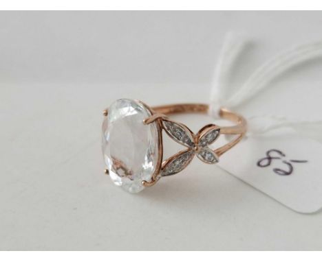 A clear stone set ring 9ct with diamond shoulders size O 3 gms