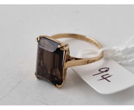 A brown stone ring 9ct size Q