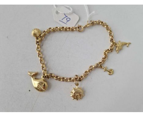 A maritime theme 9ct charm bracelet with 9ct charms 5.3g