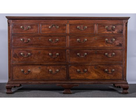 A George III mahogany mule chest, three-quarter hinged top, fitted with six dummy drawers over two banks of two drawers, cant