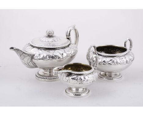 A Regency Scottish silver three-piece teaset, by Robert Gray & Son, Glasgow, probably 1820, each piece of circular pedestal f