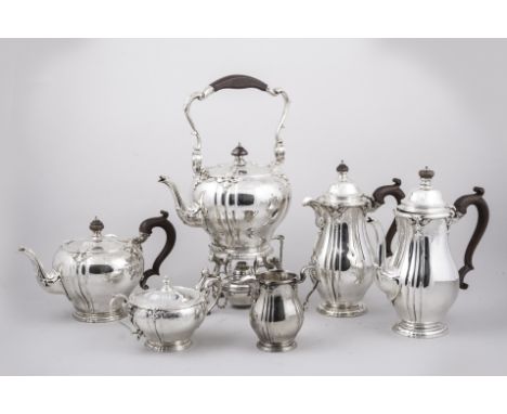 A George II style six-piece silver tea and coffee service, by Mappin & Webb, London 1924-25, comprising a pear-shape coffee p