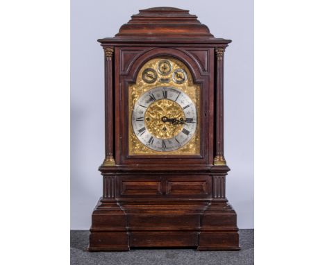 A Victorian mahogany mantel clock, of large size, arched gilt dial, signed J.W. Simons, Croydon, silvered chapter ring with t