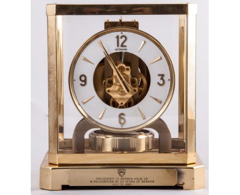 A Le-Coultre & Cie Atmos clock, no.201129, white chapter ring, Swiss movement, lacquered brass casing, with presentation plaq