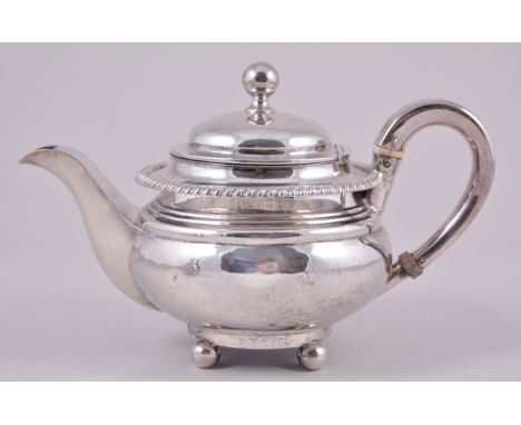 A George IV silver bachelor's teapot, Thomas & John Settle, Sheffield 1822, slightly compressed circular form with a domed li