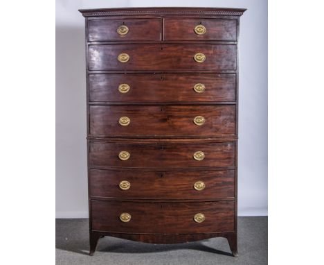 A Georgian III mahogany bowfront chest on chest, dentil cornice, fitted with two short and three long drawers to the upper se