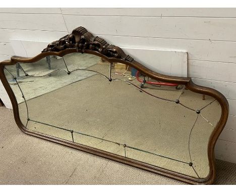 A Victorian large over mantel mirror with panelled glass edge, brass button detail and foxed glass (190cm x 110cm)