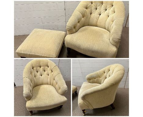 A pair of button back tub chairs on turned legs and castors, along with a matching footstools