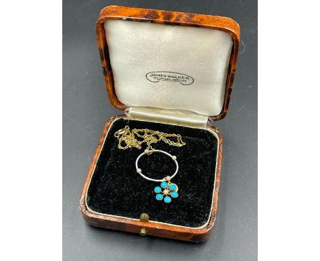 A Turquoise stone and seed pearl pendant 15ct gold (Approximate weight 2.5g) on a 9ct fine gold chain (1.1g) 