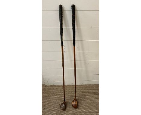 Two vintage wooden golf clubs 