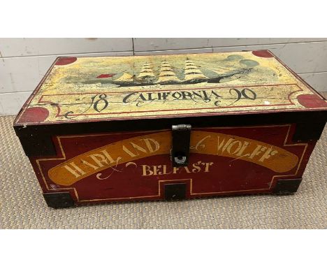 A painted wooden trunk, painted with a sailing ship 
