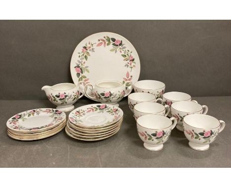 A Wedgewood tea service "Hathaway Rose", six cups and saucers, six side plates, sugar bowl. soup bowls, milk jug and dinner p