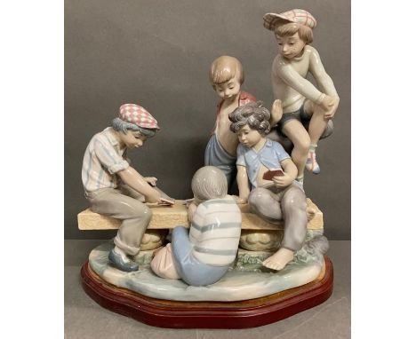 A large Nao figurine "Boys Playing Cards"