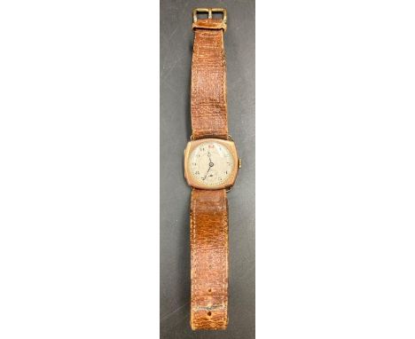 A Vintage 9ct gold watch on leather strap.